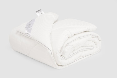 Одеяло стеганое гипоалергенное в жаккардовом сатине (100% хлопок), с кантом
